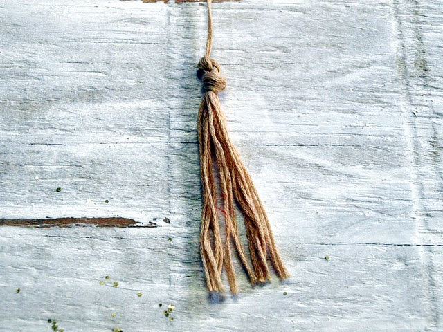 hanging bird sculpture tassle