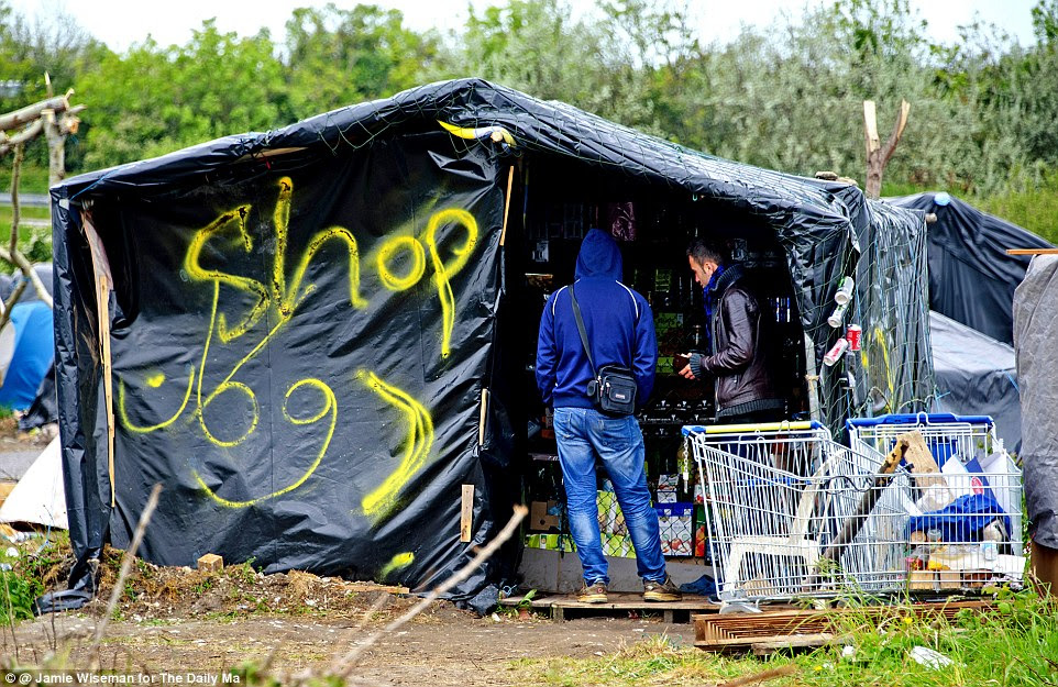 The 'town' – estimated population 5,000 – already boasts three shops, selling essentials such as tinned food, fizzy drinks and washing up liquid (and with someone else's supermarket trolleys outside)
