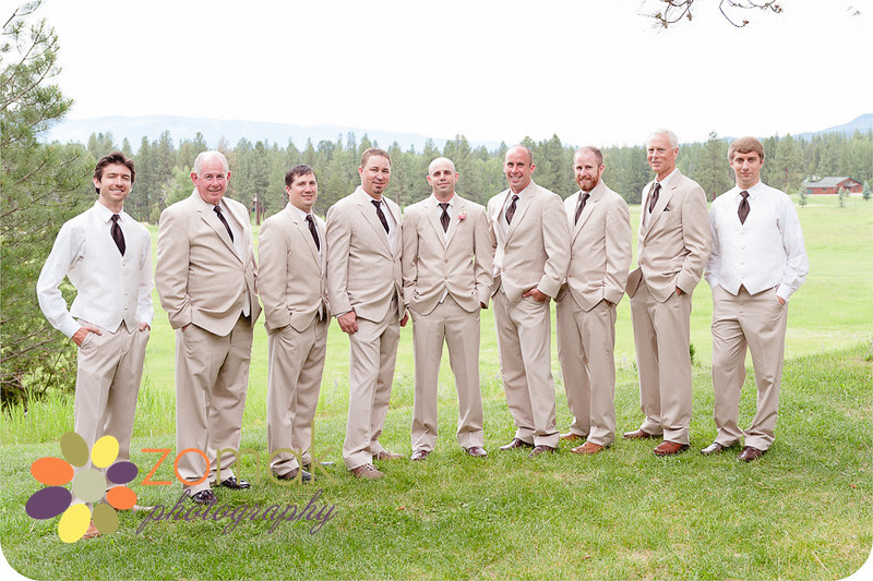 A formal photo of the groom and his groomsmen on his wedding day at Double Arrow Resort in Seeley Lake, Montana.