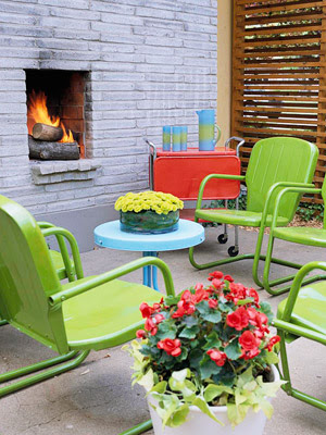 fireplace and green chairs