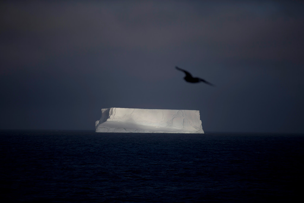 Description of . In this Jan. 27, 2015 photo, an iceberg floats in the Bahia Almirantazgo near Livingston Island, part of the South Shetland Island archipelago in Antarctica. Antarctica conjures up images of quiet mountains and white plateaus, but the coldest, driest and remotest continent is far from dormant. The majority of it is covered by ice, and that ice is constantly moving. (AP Photo/Natacha Pisarenko)
