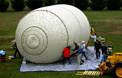 The giant 16-foot diameter tunnel plug design is tested for inflation at manufacturer ILC Dover's facility in Delaware.
