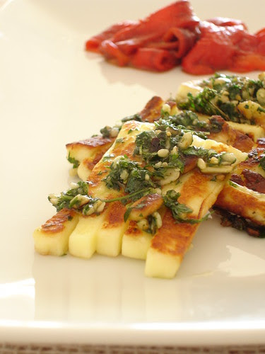Pine nut-crusted cheese with roasted pepper