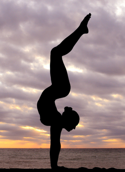 Naked Hand Stand by the Sea