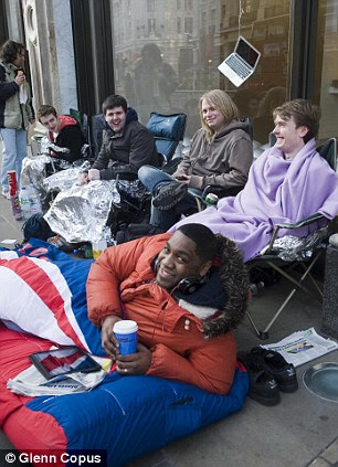 Queues outside the Apple Store Regent Street for the UK launch of the ipad 2