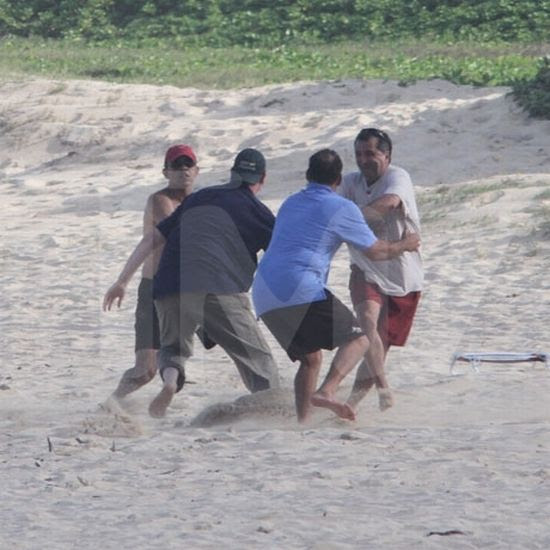President Obama Plays Football in Hawaii Pictures