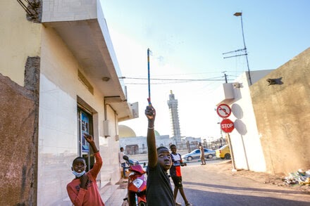 In Dakar, the usual soundtrack of fireworks on every corner was muted.