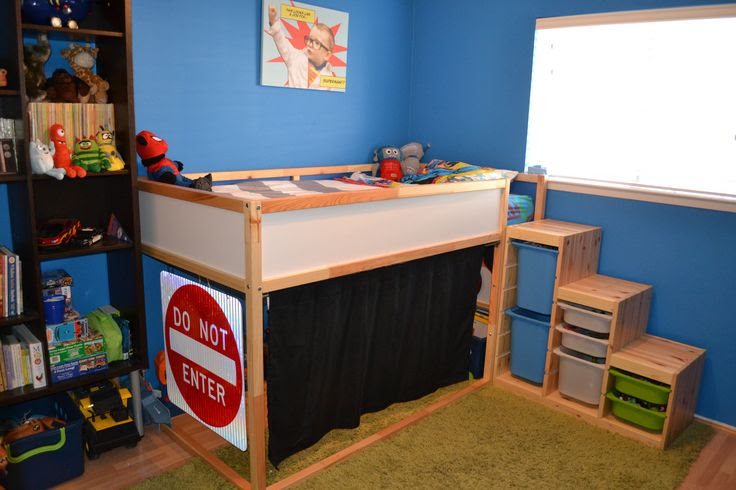 The Ikea loft bed provides room for a Batcave below. We made a custom ...