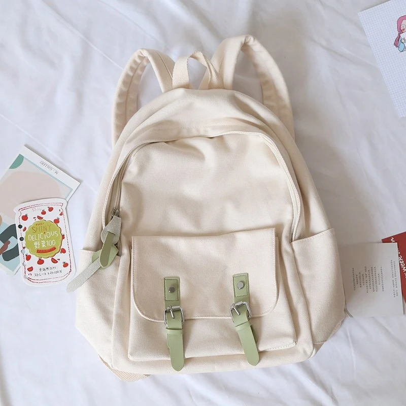 Eenvoudige rugzak voor studentes in effen kleur, ontworpen voor de schouders, ideaal voor boeken en een laptop.