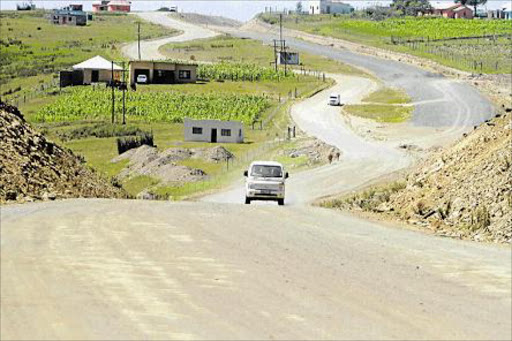 FRUSTRATION: FEBRUARY 12, 2016: A private road construction company is to build part of the 17km gravel road between Elliotdale and Madwaleni Hospital after a Bhisho construction unit was had not been not able to finish the jobafter the road and public works in-house road construction unit spent more than four years working on the site but could not complete the road and community members complained of the unnecessary delay and lack of capacity to do the road.