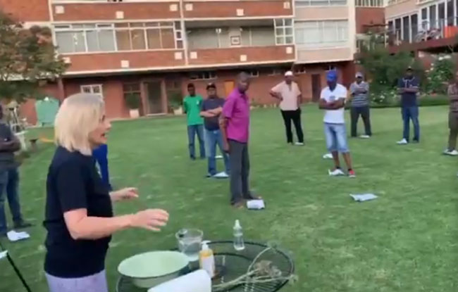 "Shelley" who gathered together a group of workers who live on the fifth floor of the Illovo building for a "hygiene lesson" is being investigated by the SAHRC.