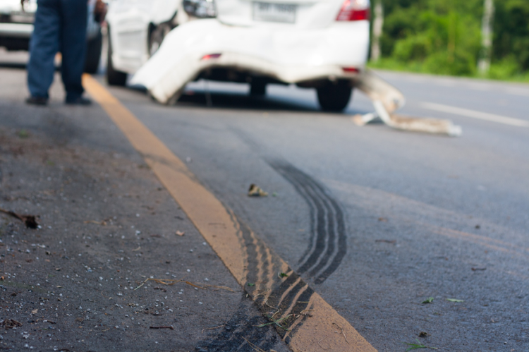 According to reports a light motor vehicle, an Opel Astra sedan, knocked down the construction workers while they were busy with road construction. Stock photo.