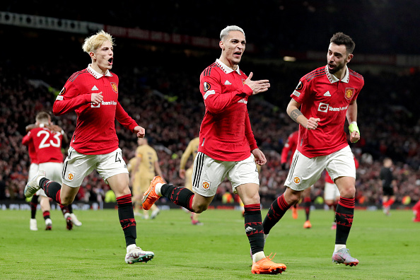 Manchester United attacker Antony celebrates his goal with teammates Alejandro Garnacho and Bruno Fernandes during their 2-1 UEFA Europa League win over FC Barcelona at the Old Trafford on February 23 2023 in Manchester United Kingdom.