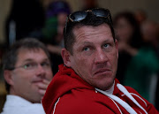 James Small and Pieter Hendricks watches the re-play during the 20th Anniversary of Springboks Rugby World Cup victory at Emirates Airline Park on June 24, 2015 in Johannesburg, South Africa. 