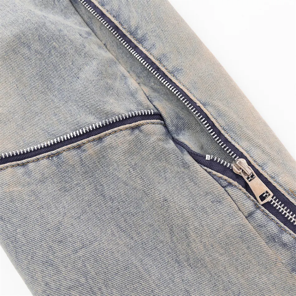 Jean large à couture zippée High Street Design. Confort et style combinés pour un look tendance et une silhouette flatteuse.