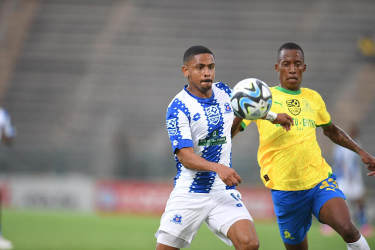 Mamelodi Sundowns' Divine Lunga and Joslin Kamatuka of Maritzburg United challenge for the ball in the Nedbank Cup last 16 match at Lucas Moripe Stadium in Atteridgeville, Pretoria on Sunday night.