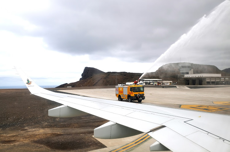 A fire engine offers a traditional welcome as the first inaugural flight arrives on St Helena from Johannesburg in November 2017. After two years of almost no air traffic, the airport is set to welcome the first scheduled Airlink flight from SA in March. File photo.