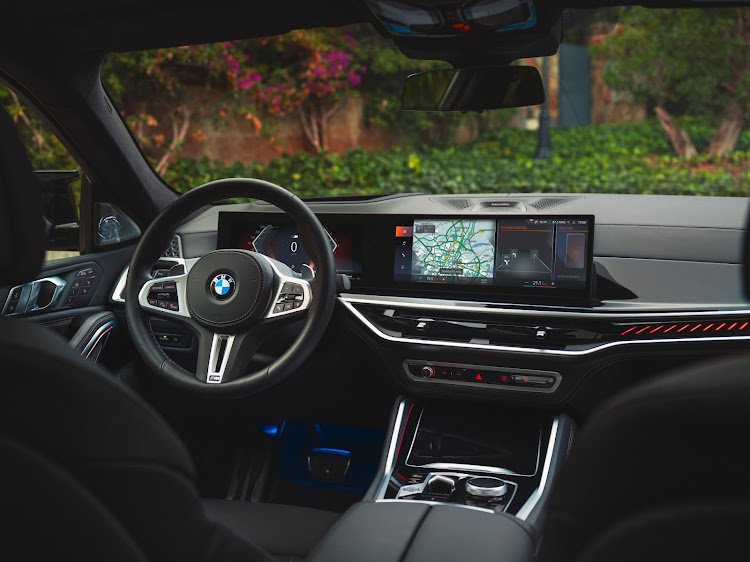 A high-definition curved screen, the latest BMW iDrive, head-up display and an augmented view function are part of new highlights for BMW's X5 and X6.