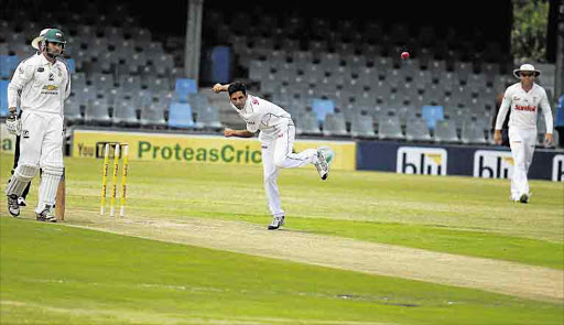 Dolphins Maharaj bowls to Warriors Ackerman during a 4 day sunfoil match at Buffalo park . Picture: MICHAEL PINYANA