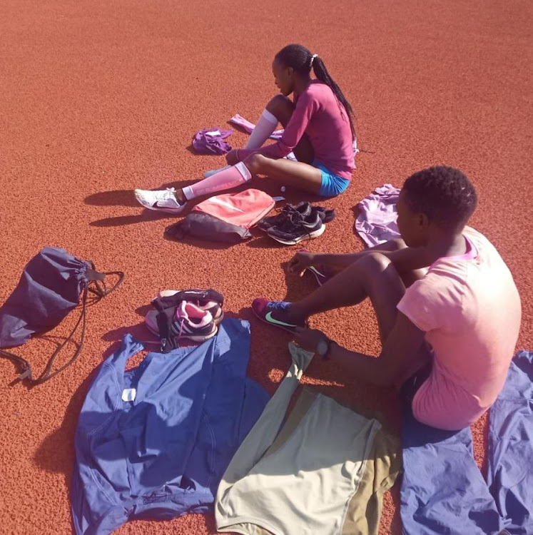 Sheila Chelangat with her younger Faith Chepkoech who runs 1500m at Kericho Green stadium