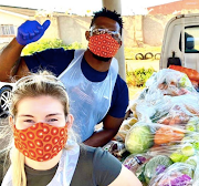 Siya Kolisi and wife Rachel Kolisi dropping off food parcels in Zwide township, Port Elizabeth.