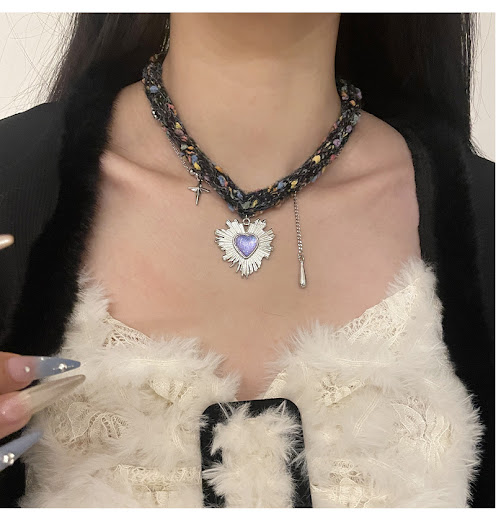 Title 6, Purple Heart Tassel Wool Choker Necklace, an el...