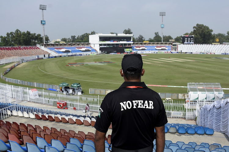 A member of the Police Elite Force stands guard at the Rawalpindi Cricket Stadium, after the New Zealand cricket team pulled out of a Pakistan cricket tour over security concerns, in Rawalpindi, Pakistan September 17 2021. Picture: REUTERS/WASEEM KHAN