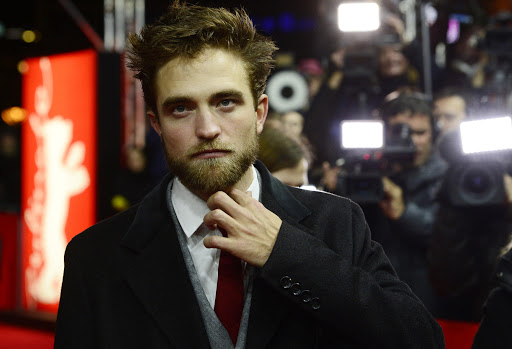 British actor Robert Pattinson poses for photographers upon arrival for the screening of the film "Life" presented as Berlinale Special at the 65th Berlin International Film Festival Berlinale in Berlin, on February 9, 2015.