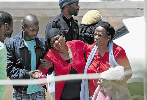 A MOTHER'S PAIN: Senzo Meyiwa's mother, Ntombifuthi, returns to her home near Durban after her discharge from hospital