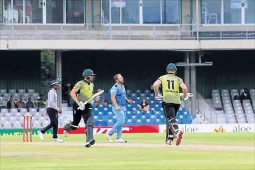 GAME ON: Titans and Warriors players in action during their clash at Buffalo Park Stadium yesterday Picture: SIBONGILE NGALWA