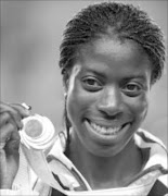 TAINTED: Britain's Christine Ohuruogu. Pic. David J Phillip. 29/08/07. © AP.