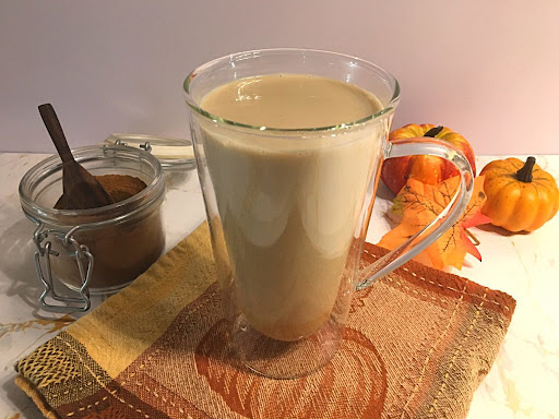 A cup of coffee with homemade pumpkin creamer.