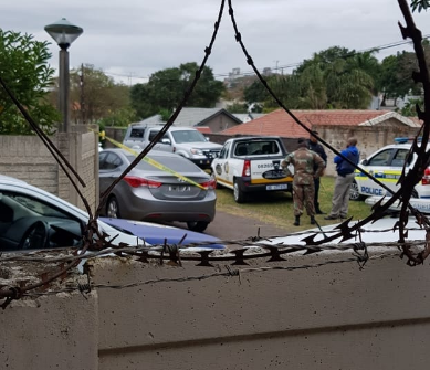 Police examine an abandoned car believed to have been used as the getaway vehicle by three people who robbed a jewellery store in Umhlanga on August 23, 2018.