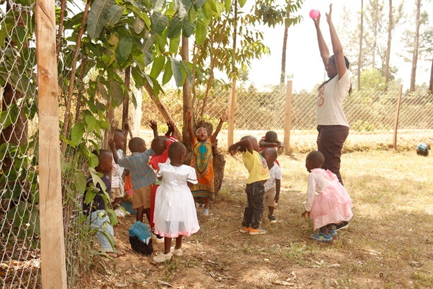 Edna Sabin conducts a motor skills assesment on children at one of their iHELP centers in Kakamega.