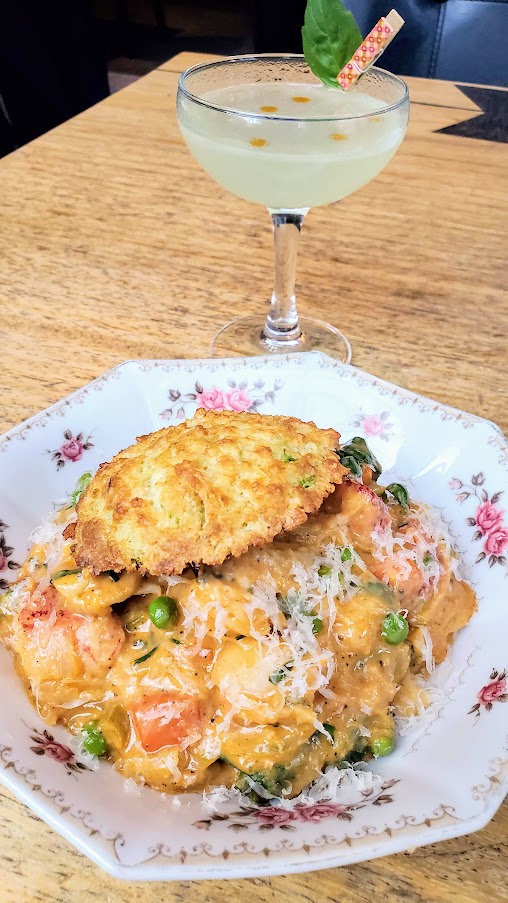 Portland Dining Month 2020 at Hairy Lobster: Lobster ‘n jalapeño cheddar biscuits with Maine lobster, spring root vegetables and wilted greens