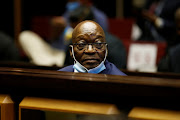 Former president Jacob Zuma sits in the dock after recess in his corruption trial in Pietermaritzburg.