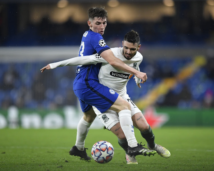 Krasnodar's Remy Cabella, right, battles for possession Chelsea's Billy Gilmour in the Champions League Group E match at Stamford Bridge, London on December 8, 2020