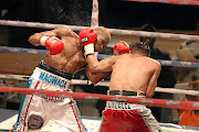 Mzuvukile Magwaca in action against Jose Gonzalez during the WBA Bantamweight International title fight at the Orient Theatre.