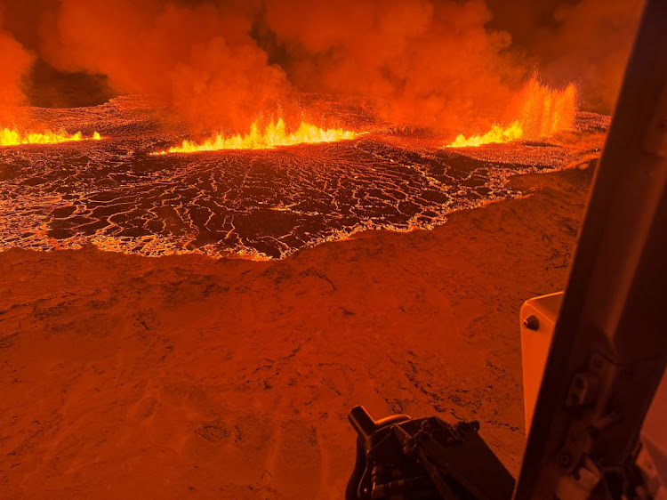 A volcano spews Lava and smoke as it erupts, north of Grindavik, Reykjanes Peninsula, Iceland, on December 19 2023. Picture: Icelandic Coast Guard via REUTERS