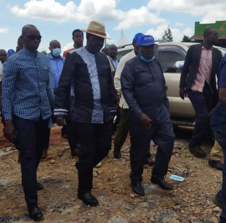 Azimio presidential candidate Raila Odinga (center) in the company of ODM members arriving at Isecha for the burial of Priscah Asanyo, mother to Geoffrey Asanyo who is vying for Kitutu Chache North on ODM ticket (PHOTO BY MAGATI OBEBO)