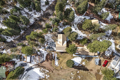 House with garden and snowy trees in this luxury property for rent in Lyons ($1,620,000)