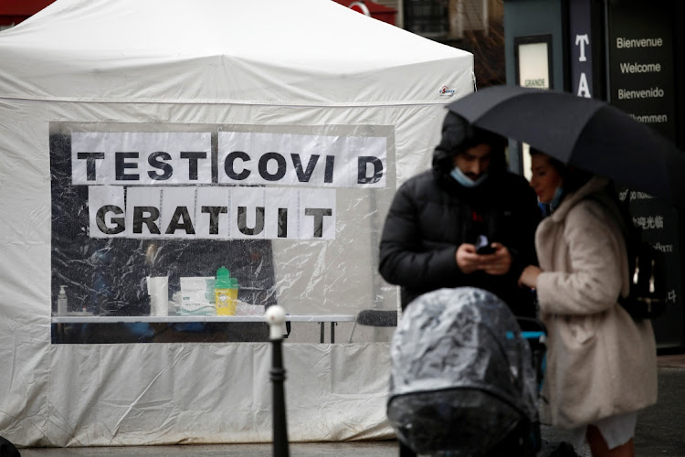 A Covid-19 rapid test center tent is set up in front of a pharmacy in Paris, France, January 14, 2021.