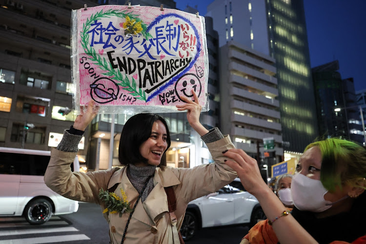 Participants hold signs and shout slogans during the Women’s March Tokyo on March 8 2023 in Tokyo, Japan, on March 8 2023. Picture: GETTY IMAGES/TAKASHI AOYAMA