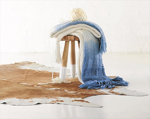 Snuggle up warm with Weylandts’ cool aqua range of throws, R695-R795.