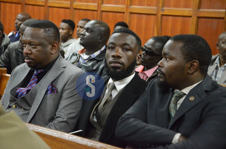 Former Nairobi governor Mike Sonko accompanies alleged fake lawyer Brian Mwenda for a plea taking at Milimani Law Courts, Nairobi on October 18,2023