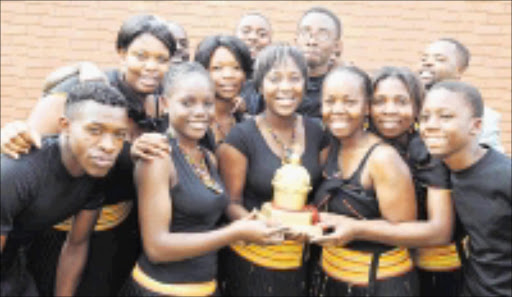 WINNERS: Worshio House Band members with the crown they won at the Crown Gospel Musical Awards in Durban in August. Pic. Elijar Mushiana. 09/09/2008. © Sowetan