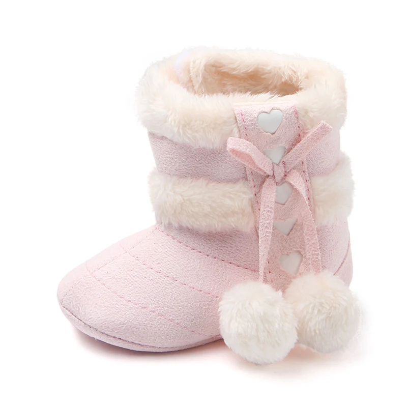 Bottines de Noël à nœud pour bébés et tout-petits, douces et confortables, parfaites pour les premiers pas et les fêtes de fin d'année.