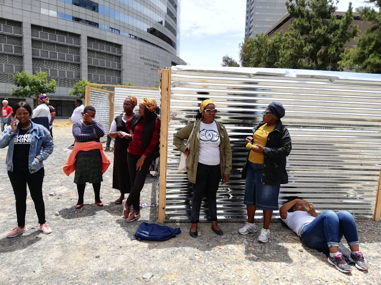 Housing activists who built shacks on a vacant site on Cape Town's Foreshore on Tuesday December 4, 2018.