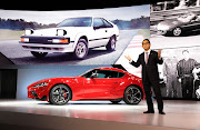 Akio Toyoda, chairman of the Japan Automobile Manufacturers' Association, with the new Toyota Supra.