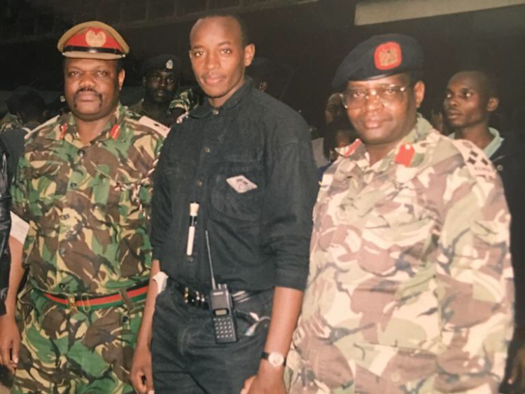 Major General George Agoi, TV reporter Linus Kaikai and Air Force Brig Samuel Thuita during recovery operations after the US Embassy bombing in 1998. i